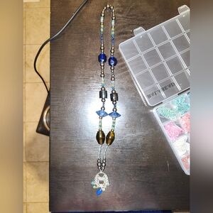 Handcrafted Beaded Necklace with Blue and Gold Accents